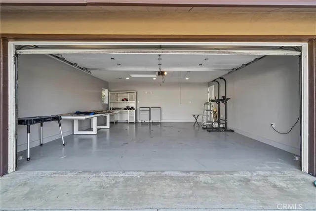 a view of a hallway with seating area
