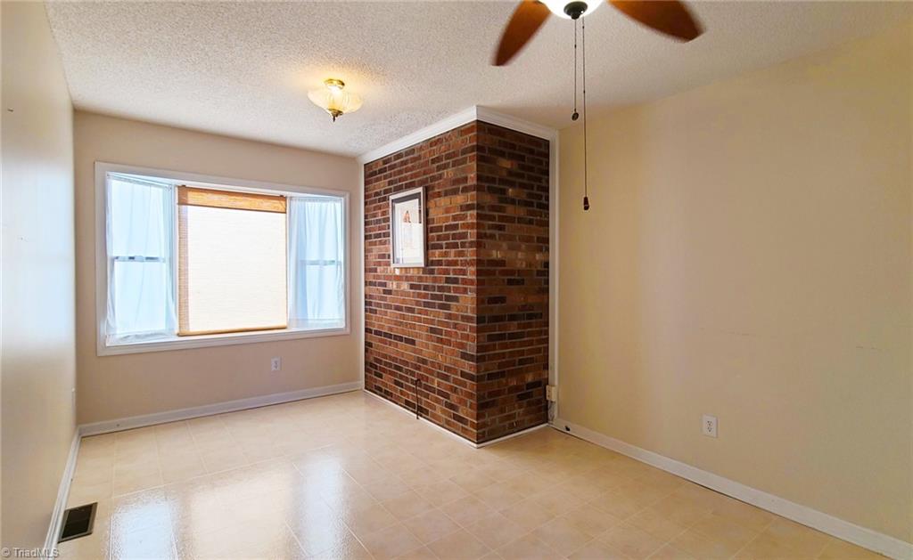 2301 Griffith Road Winston-Salem, NC 27103 - Photo 16 of 50 Room/office area between garage and kitchen. Posible to use as large formal dining room.