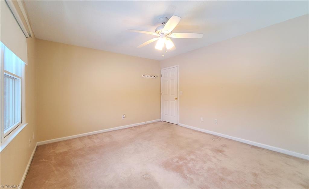 2301 Griffith Road Winston-Salem, NC 27103 - Photo 17 of 50 Primary bedroom with view to the back yard