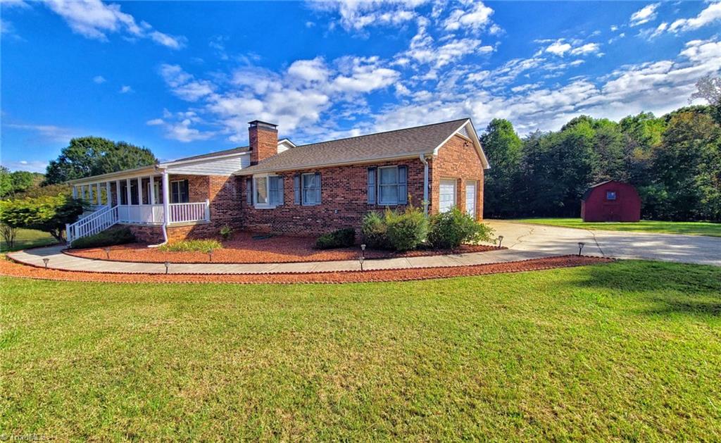 2301 Griffith Road Winston-Salem, NC 27103 - Photo 2 of 50 Front of the house with the 2 car driveway on the right