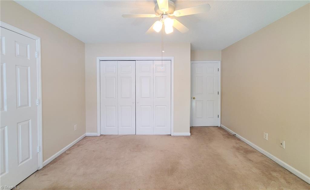 2301 Griffith Road Winston-Salem, NC 27103 - Photo 27 of 50 Third bedroom located towards the middle with view to the front yard