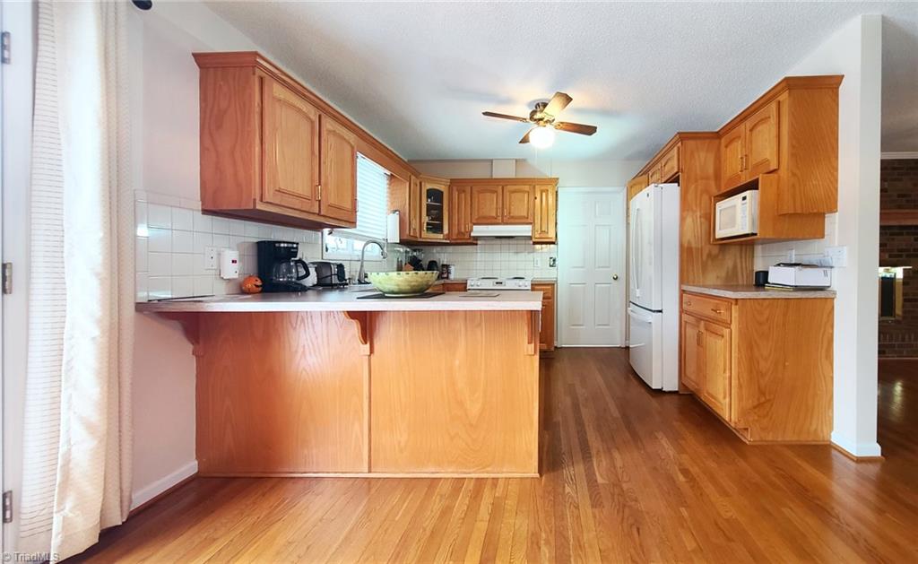 2301 Griffith Road Winston-Salem, NC 27103 - Photo 9 of 50 Kitchen area with overhang counter
