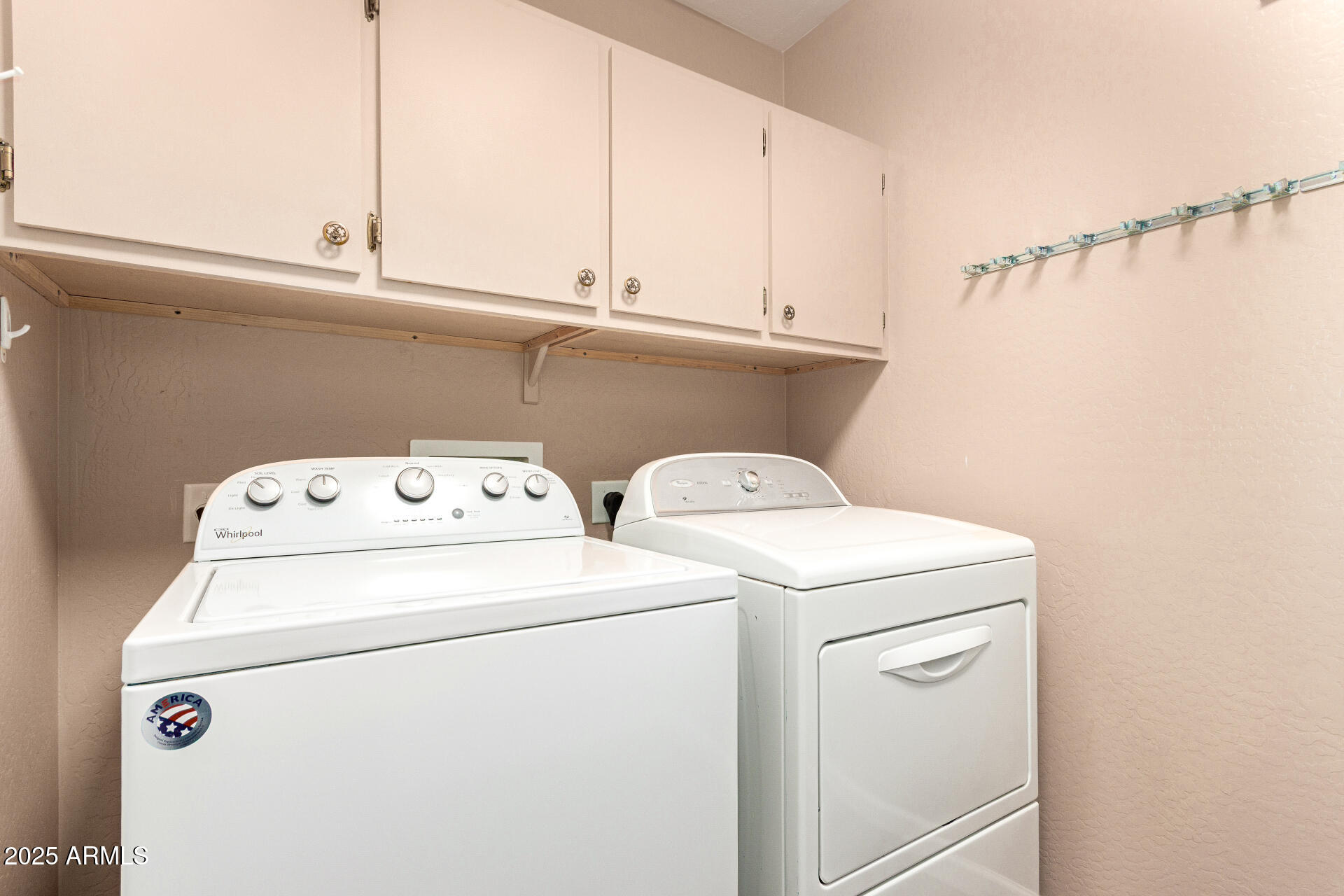 40214 West Lococo Street Maricopa, AZ 85138 - Photo 24 of 31 a utility room with dryer and washer