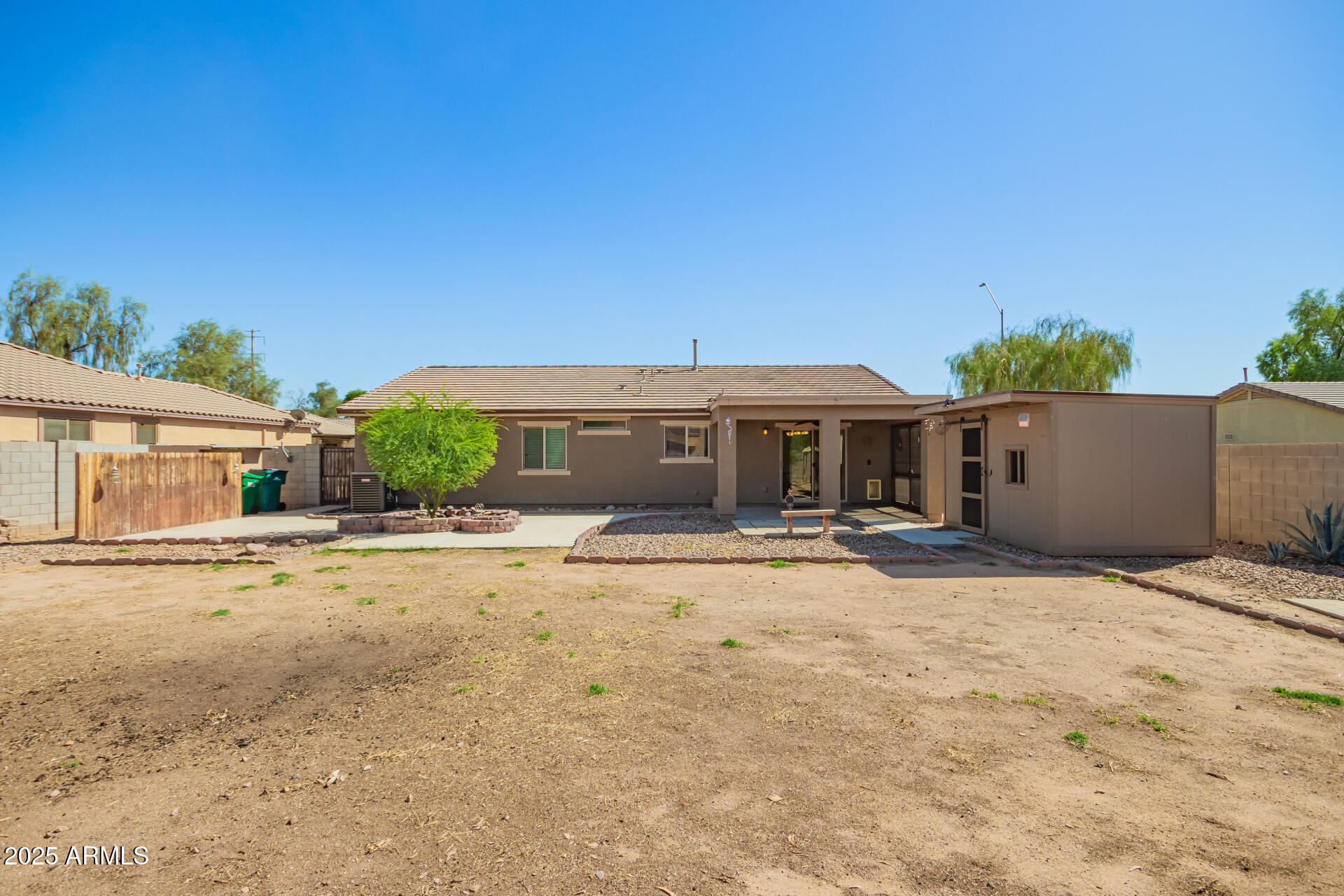 40214 West Lococo Street Maricopa, AZ 85138 - Photo 27 of 31 front view of a house with a outdoor space