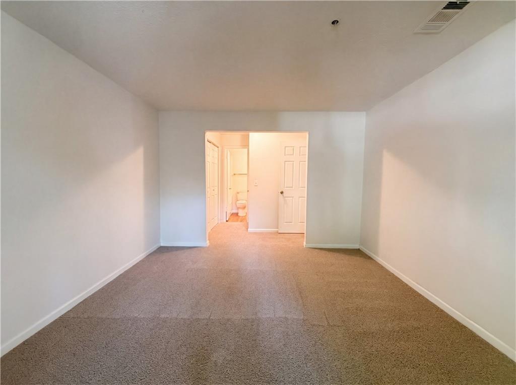 573 Cobblestone Trail Avondale Estates, GA 30002 - Photo 11 of 23 an empty room with window