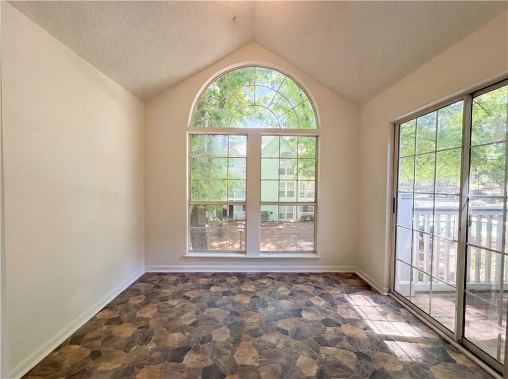573 Cobblestone Trail Avondale Estates, GA 30002 - Photo 13 of 23 an empty room with windows