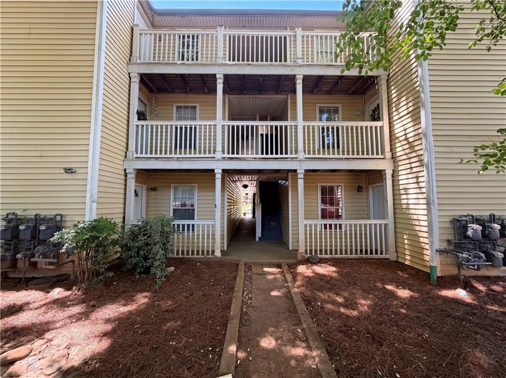 573 Cobblestone Trail Avondale Estates, GA 30002 - Photo 21 of 23 a front view of a house with entryway