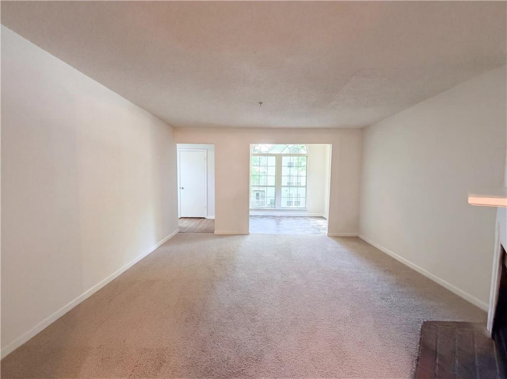 573 Cobblestone Trail Avondale Estates, GA 30002 - Photo 5 of 23 a view of an empty room with a window