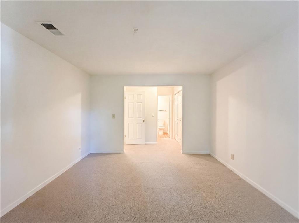573 Cobblestone Trail Avondale Estates, GA 30002 - Photo 9 of 23 a view of an empty room with a window