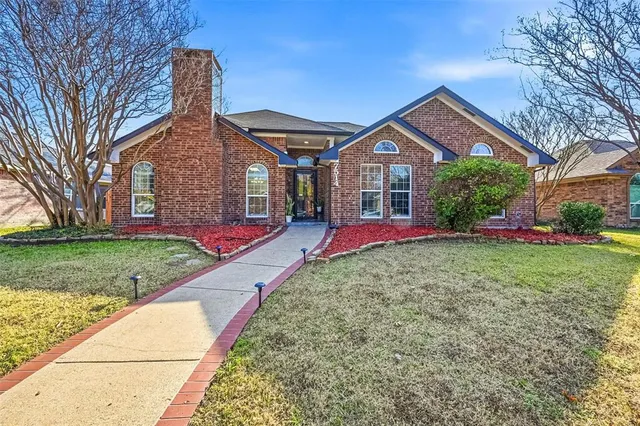 a view of outdoor space yard and front view of a house