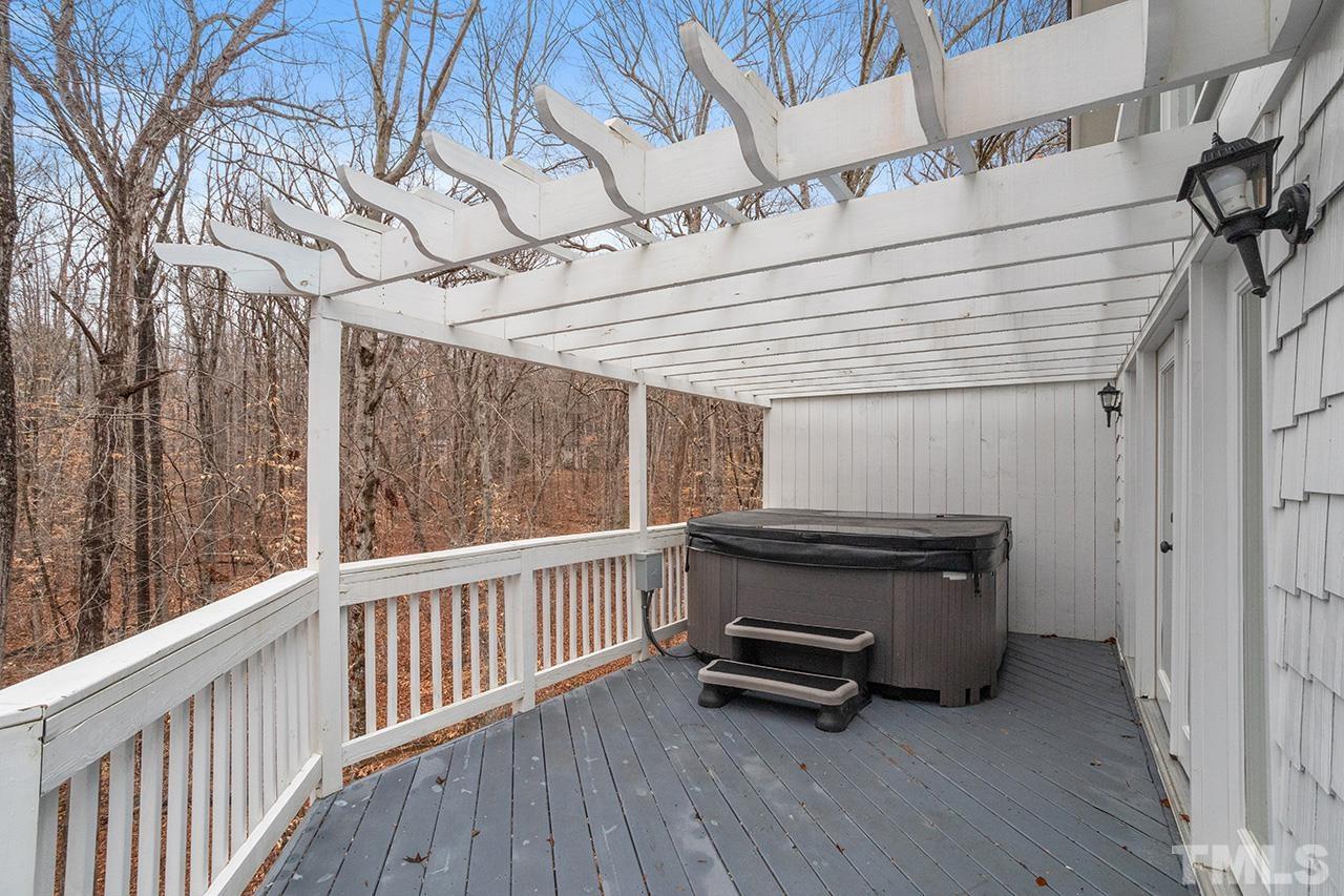 9132 Sutherland Court Raleigh, NC 27615 - Photo 33 of 36 a view of a two chairs in the balcony