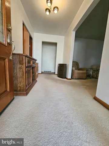 a view of a livingroom with furniture