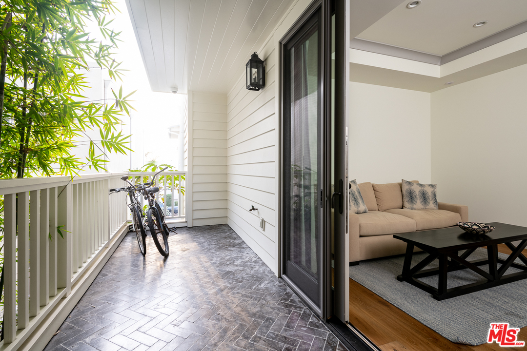 703 Bayview Drive Manhattan Beach, CA 90266 - Photo 16 of 30 a view of a balcony and chairs