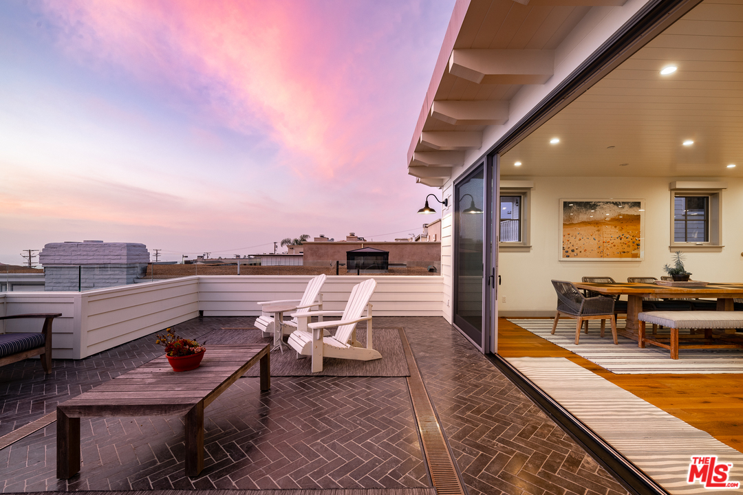 703 Bayview Drive Manhattan Beach, CA 90266 - Photo 29 of 30 a view of a terrace with seating area