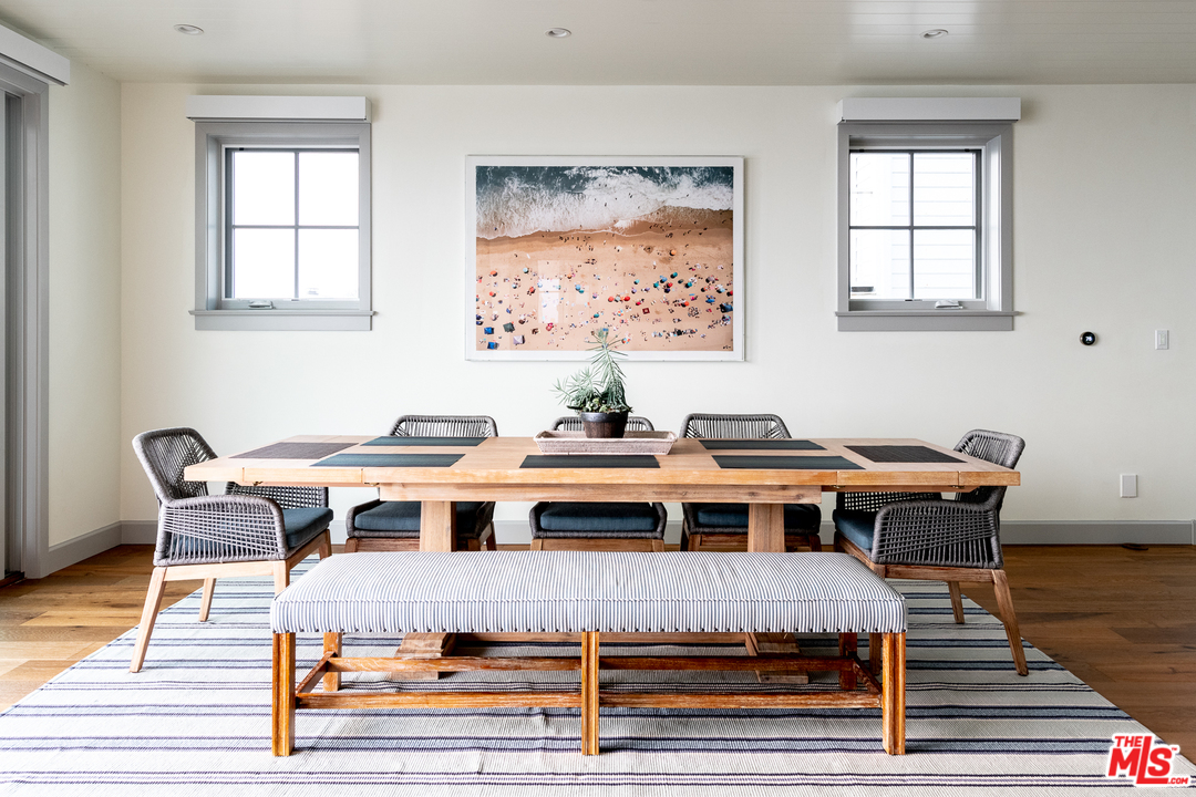 703 Bayview Drive Manhattan Beach, CA 90266 - Photo 4 of 30 a view of a dining room with furniture window and wooden floor