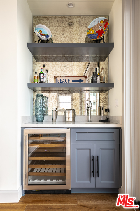 703 Bayview Drive Manhattan Beach, CA 90266 - Photo 5 of 30 a kitchen with a stove and cabinets