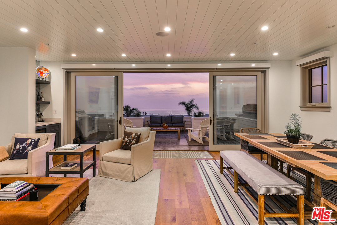 703 Bayview Drive Manhattan Beach, CA 90266 - Photo 6 of 30 a living room with furniture and a table