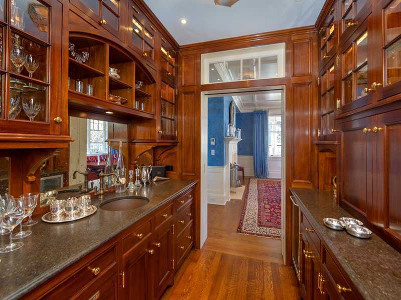 107 Long Neck Point Road Darien, CT 06820 - Photo 12 of 25 a view of a living room and utility room