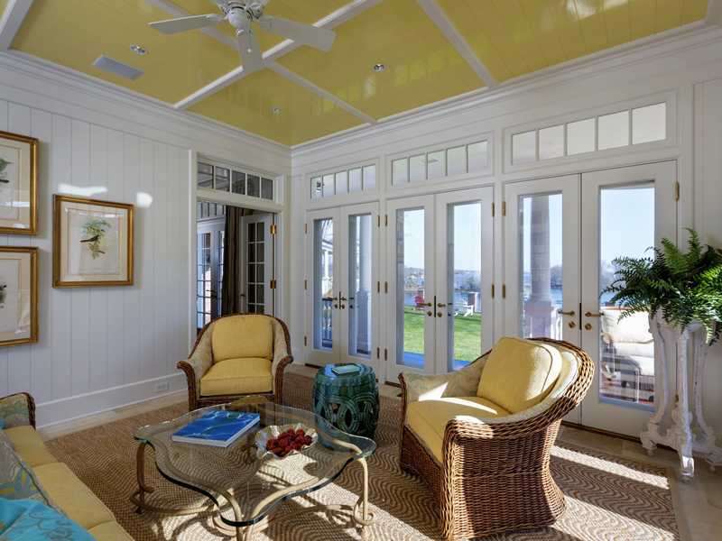 107 Long Neck Point Road Darien, CT 06820 - Photo 14 of 25 a living room with furniture and a potted plant