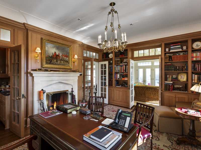 107 Long Neck Point Road Darien, CT 06820 - Photo 15 of 25 a living room with furniture fireplace and flat screen tv