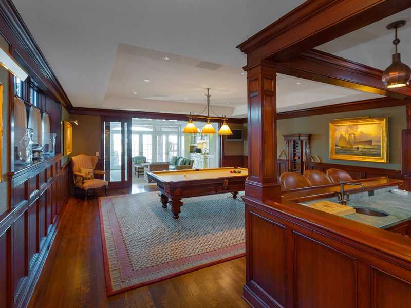 107 Long Neck Point Road Darien, CT 06820 - Photo 16 of 25 a room with pool table and windows