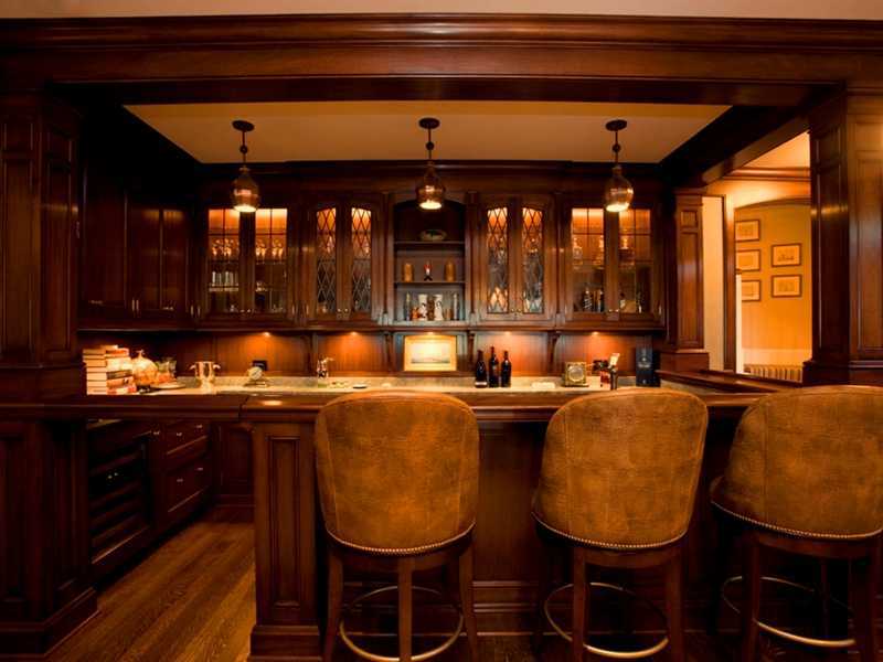 107 Long Neck Point Road Darien, CT 06820 - Photo 17 of 25 an outdoor dining space with furniture and chandelier