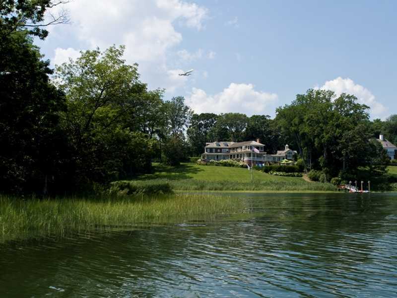 107 Long Neck Point Road Darien, CT 06820 - Photo 25 of 25 a view of a lake view with a fountain