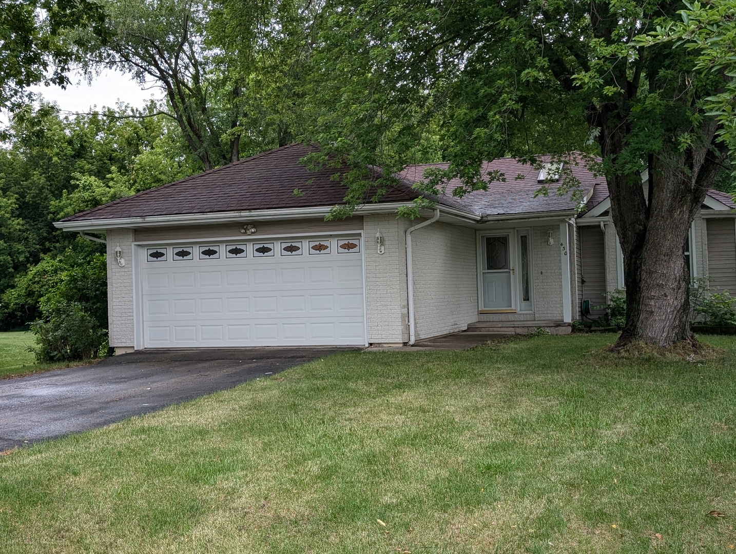430 Pembroke Road Southwest Poplar Grove, IL 61065 - Photo 1 of 20 a view of a backyard with a garden