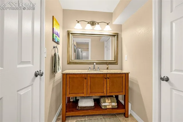 a bathroom with a sink a mirror and a bathtub