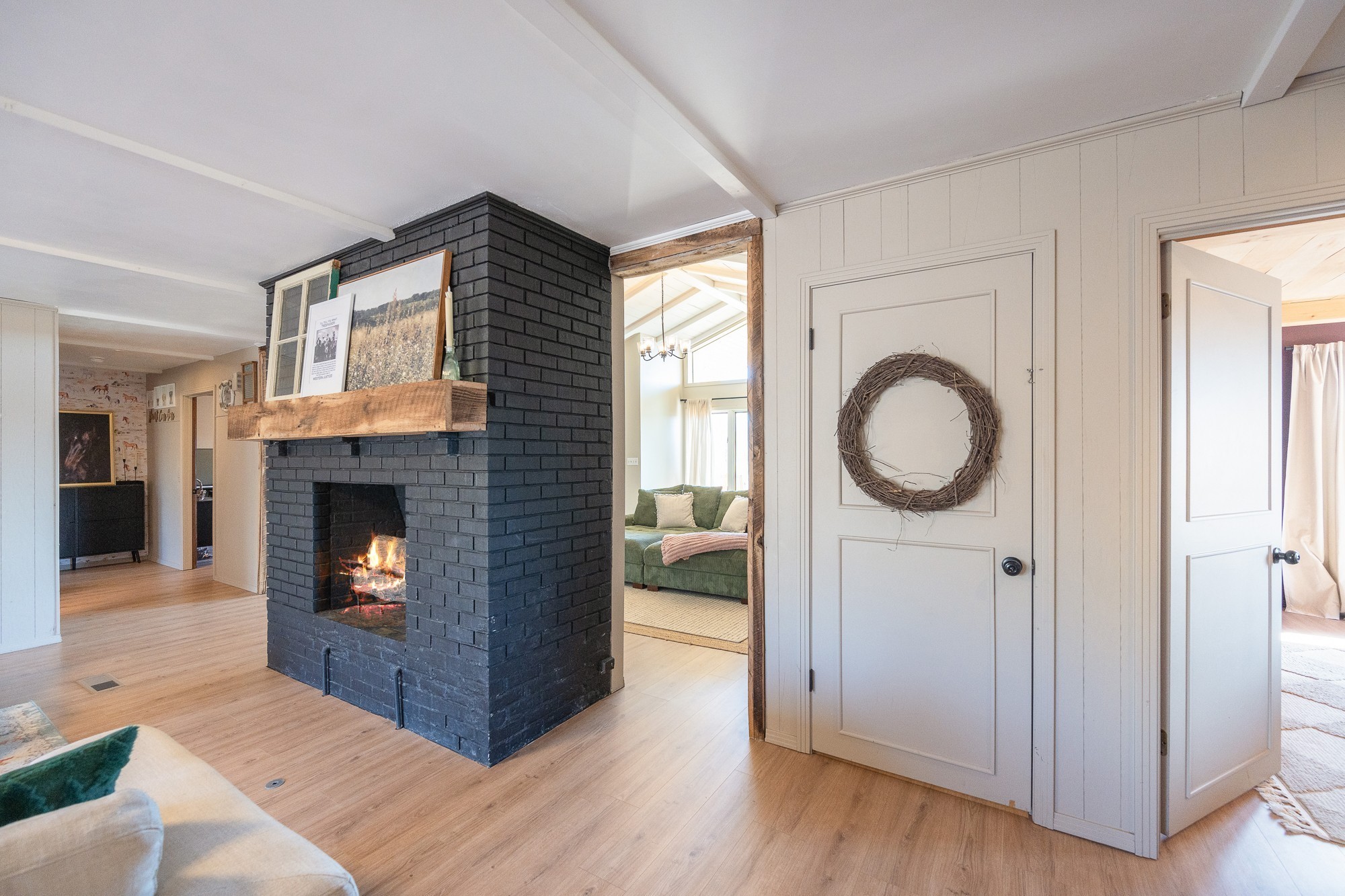 3080 Bible Hill Road Parsons, TN 38363 - Photo 11 of 76 a living room with wooden floors and a fireplace
