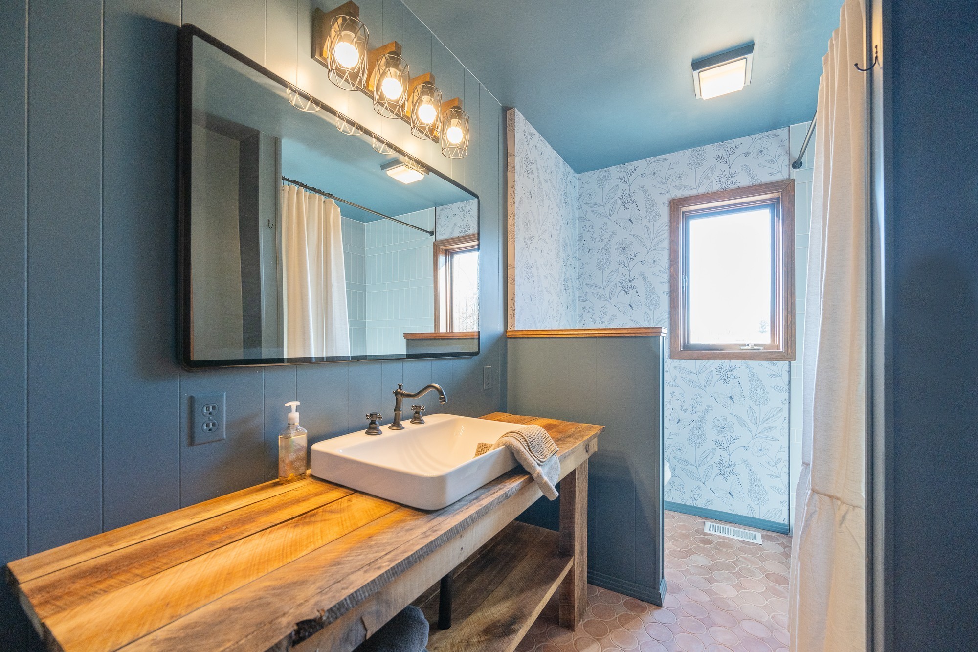 3080 Bible Hill Road Parsons, TN 38363 - Photo 28 of 76 a bathroom with a sink vanity and a mirror
