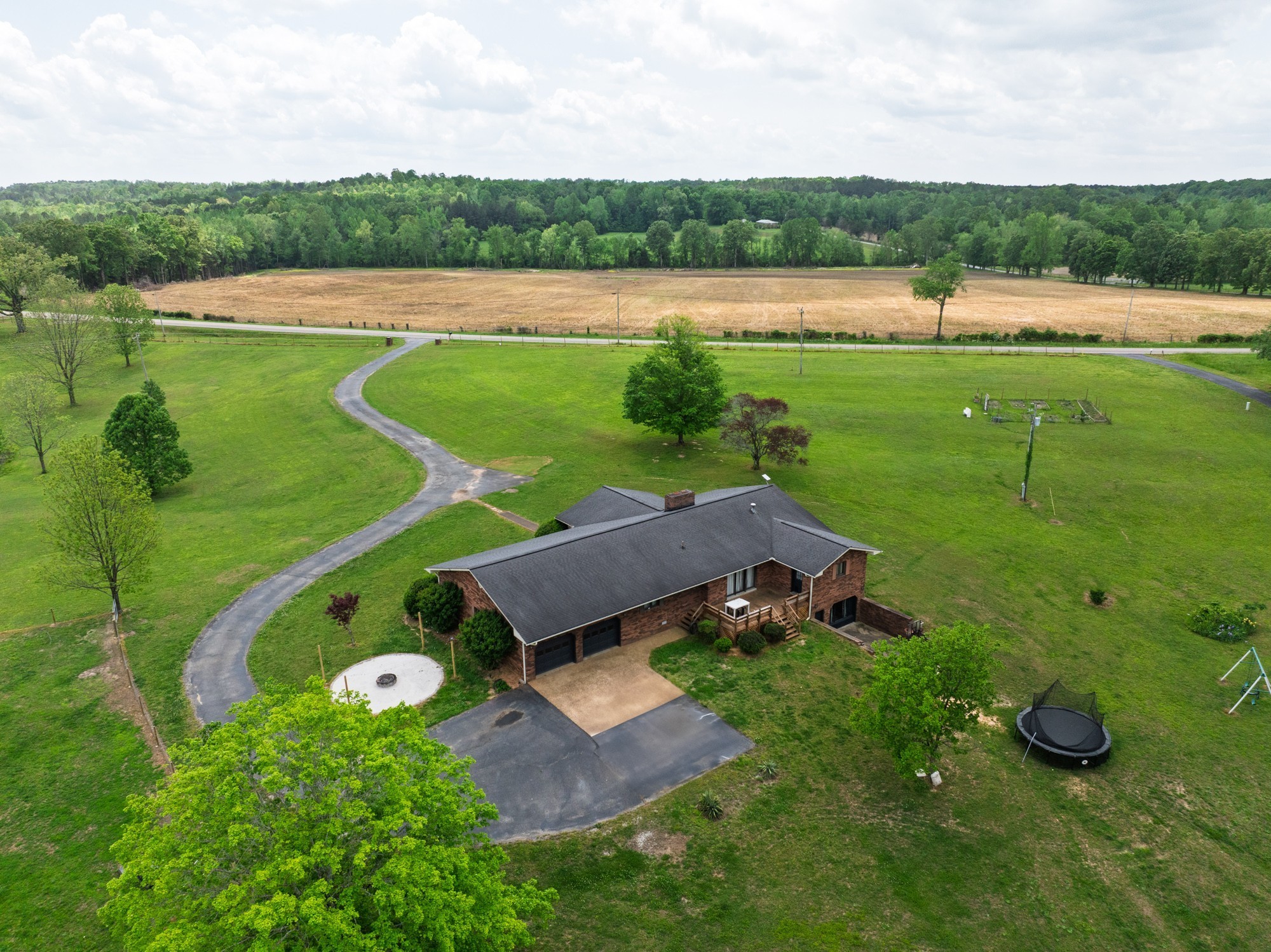 3080 Bible Hill Road Parsons, TN 38363 - Photo 54 of 76 an aerial view of a house with a yard