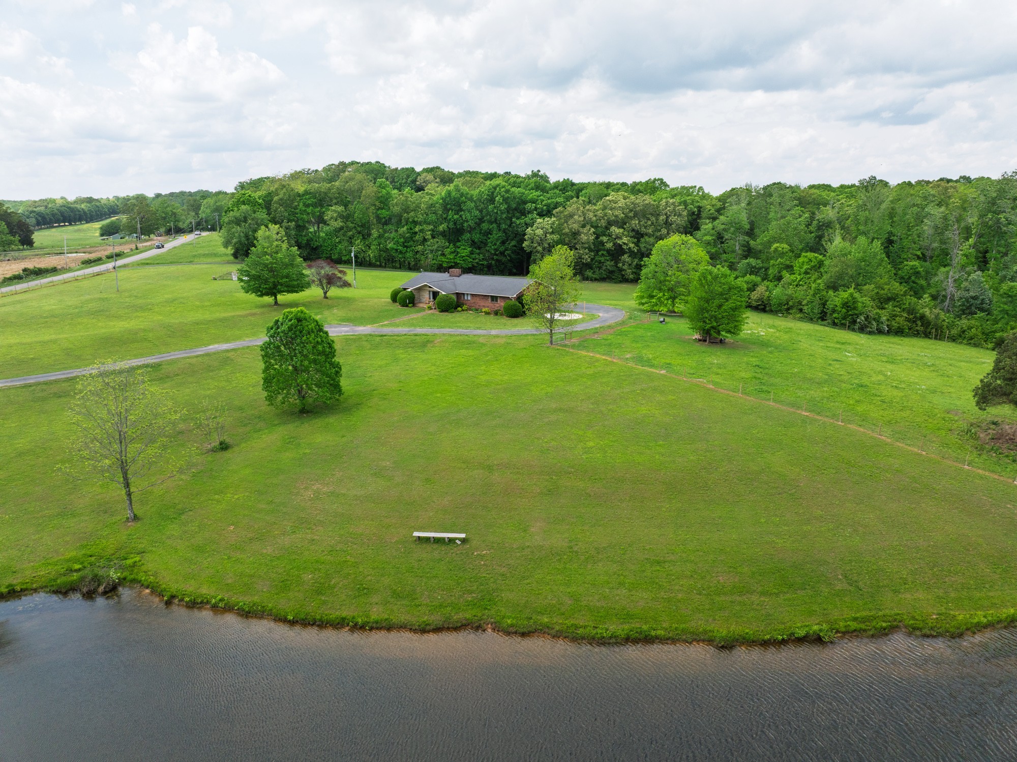 3080 Bible Hill Road Parsons, TN 38363 - Photo 6 of 76 a view of a golf course with a garden