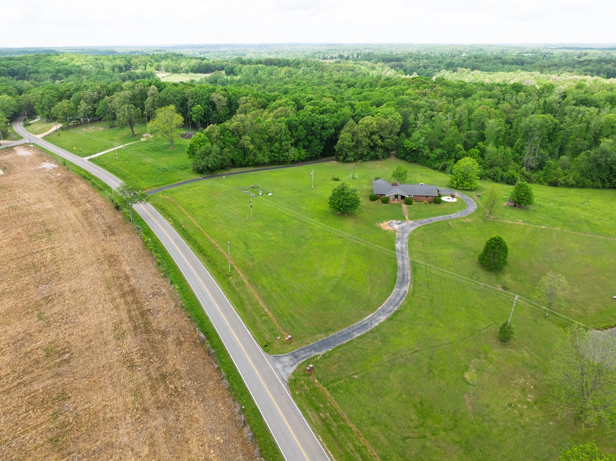 3080 Bible Hill Road Parsons, TN 38363 - Photo 71 of 76 a view of a swimming pool with a yard