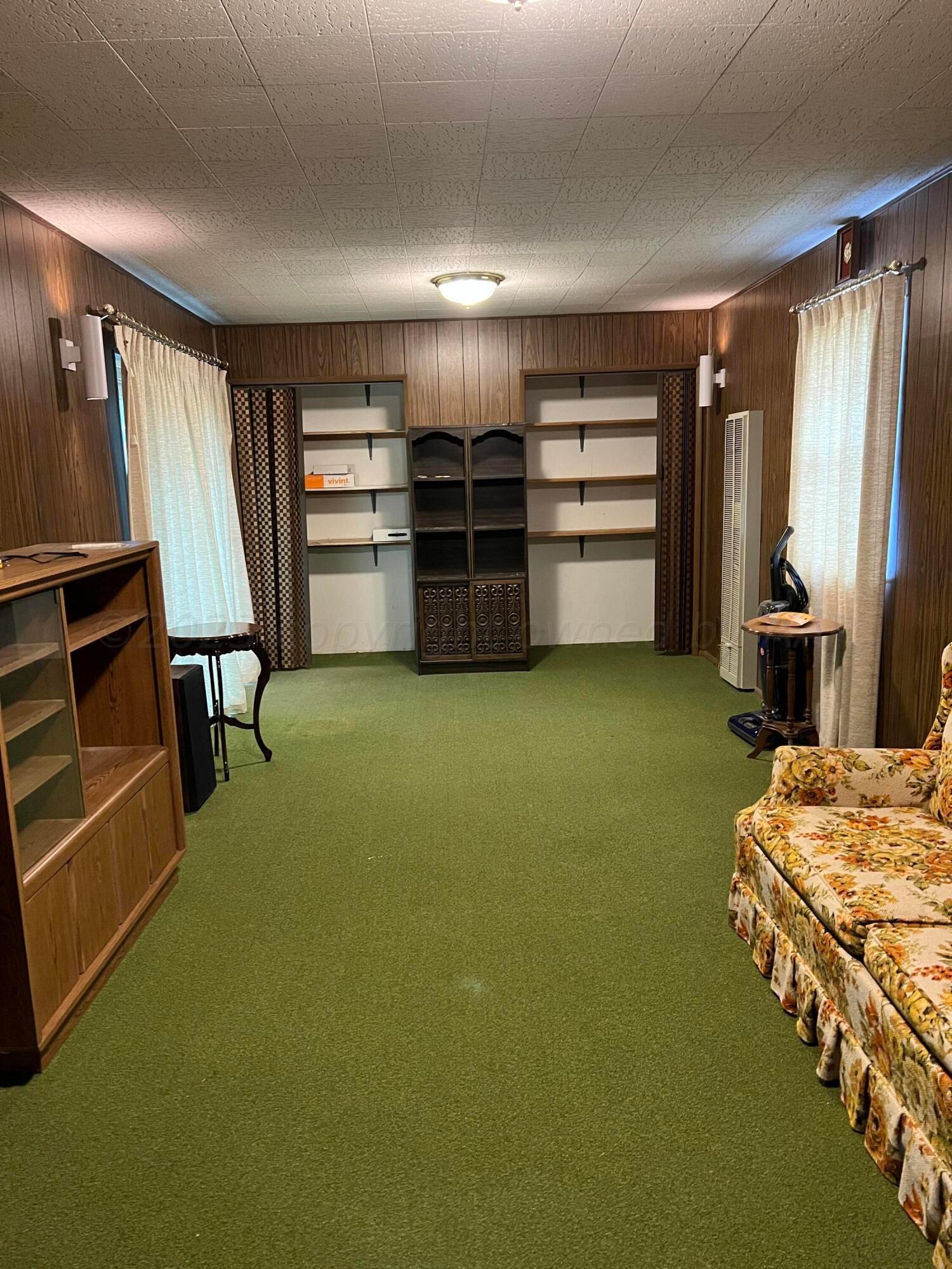 6012 Garden Lane Amarillo, TX 79106 - Photo 12 of 14 a bed room with a bed and furniture