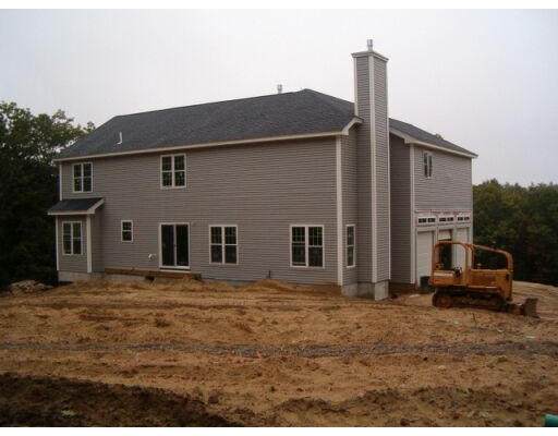 Lot 5 Holt Road Ashburnham, MA 01430 - Photo 2 of 4 a house that has a window in front of it