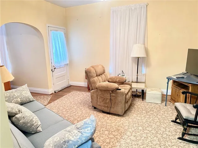 a living room with furniture and a couch