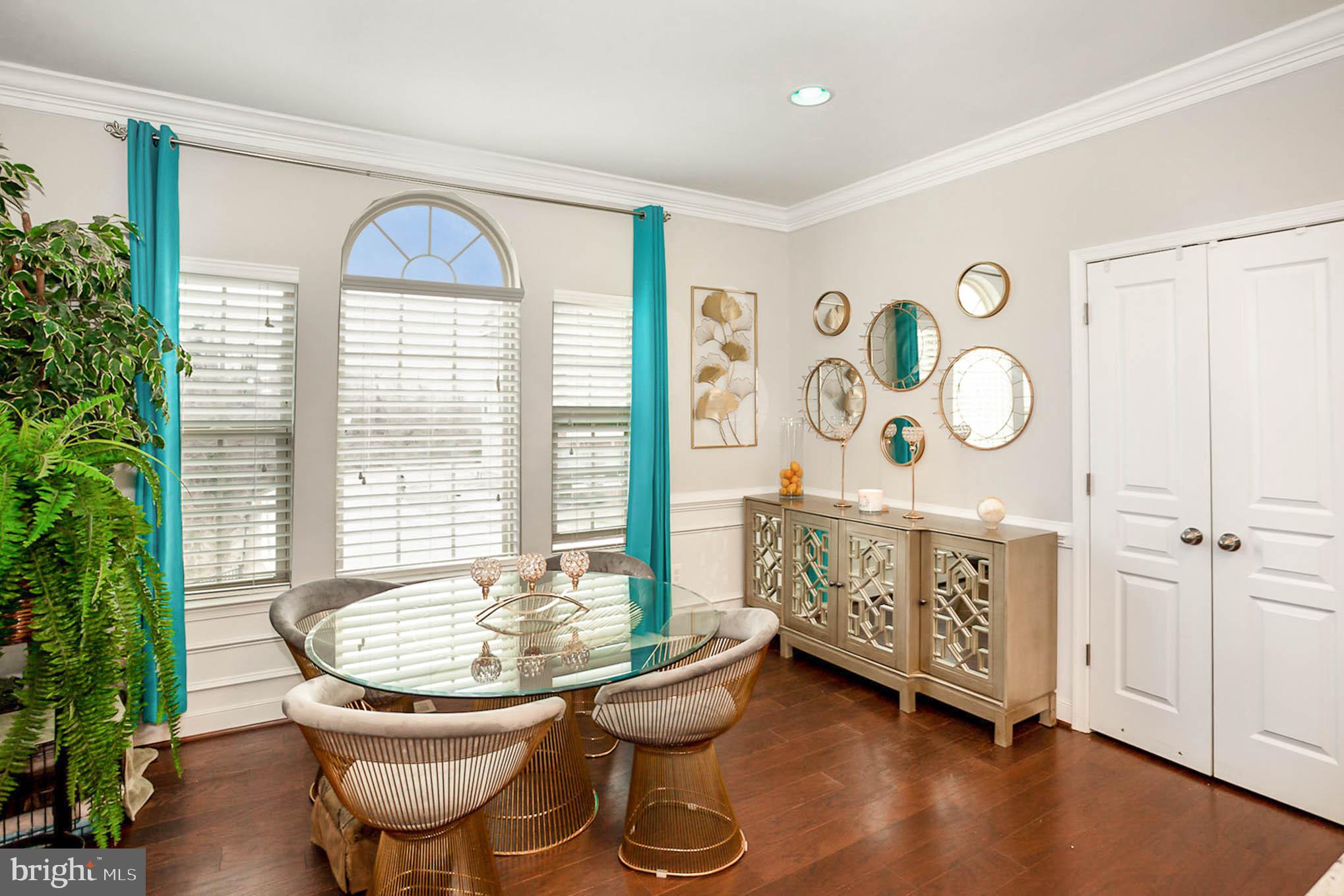 3421 Pintail Road Baltimore, MD 21222 - Photo 19 of 42 Dining Area with Hardwood Floors