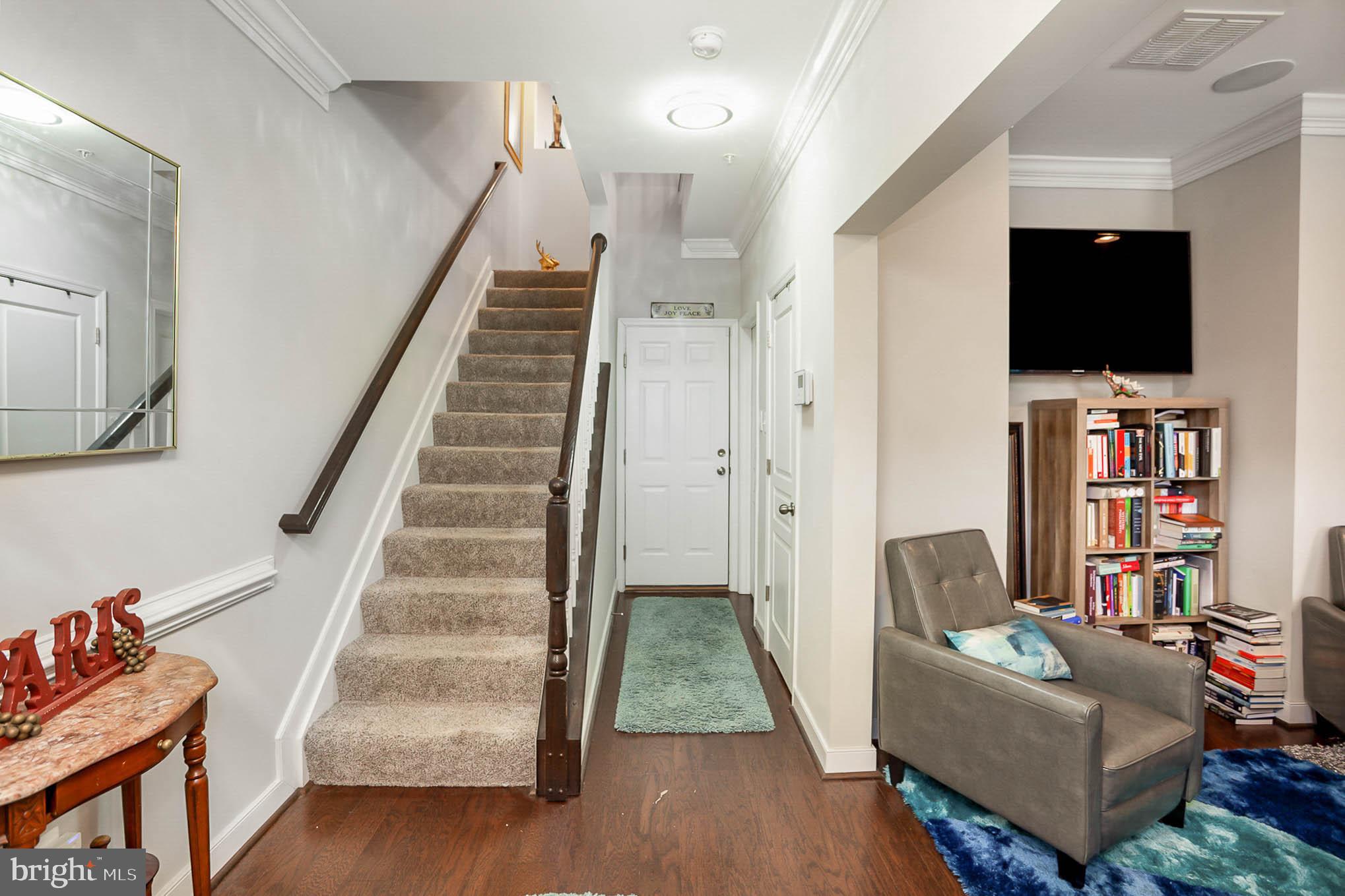 3421 Pintail Road Baltimore, MD 21222 - Photo 8 of 42 Hardwood Foyer & stairs leading to upper level 1