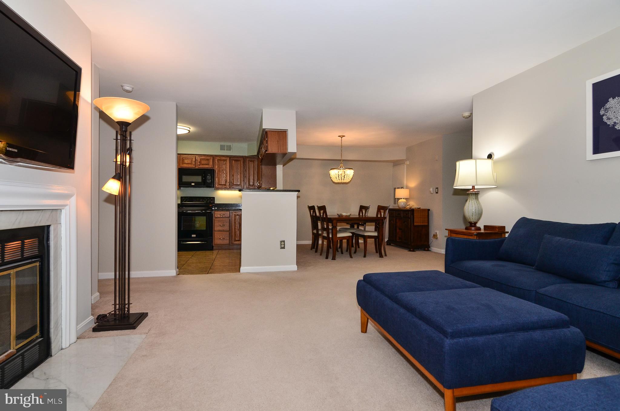 2217 Lovedale Lane, Unit C Reston, VA 20191 - Photo 5 of 37 Living Room opens to dining area