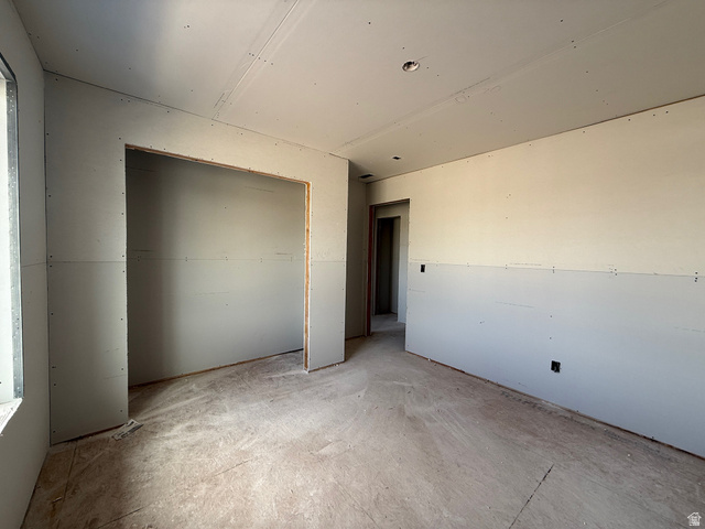 809 South 270th Street East, Unit 2 Smithfield, UT 84335 - Photo 12 of 23 Unfurnished bedroom with a closet
