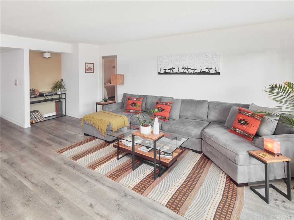 356 Virginia Street, Unit 202 El Segundo, CA 90245 - Photo 2 of 22 a living room with furniture and wooden floor