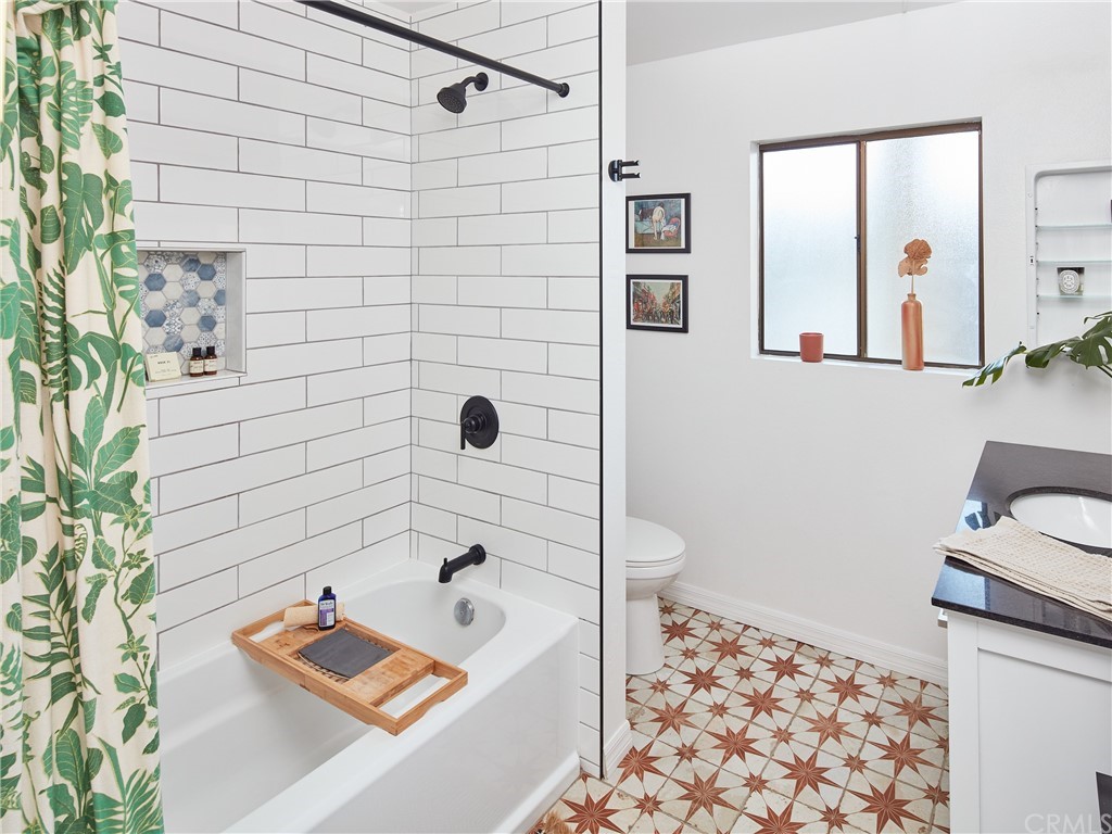 356 Virginia Street, Unit 202 El Segundo, CA 90245 - Photo 16 of 22 a bathroom with a sink a toilet and shower