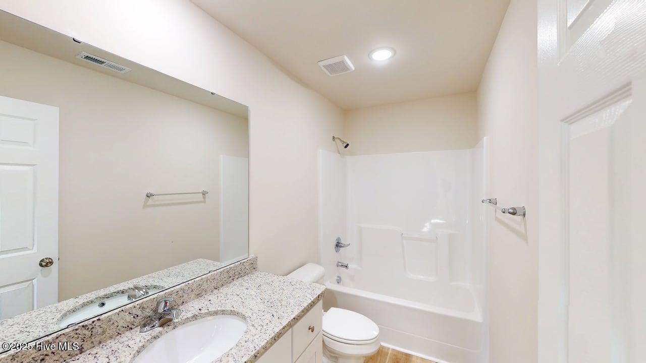 1399 Pinkney Road Pikeville, NC 27863 - Photo 13 of 21 Hall Bathroom