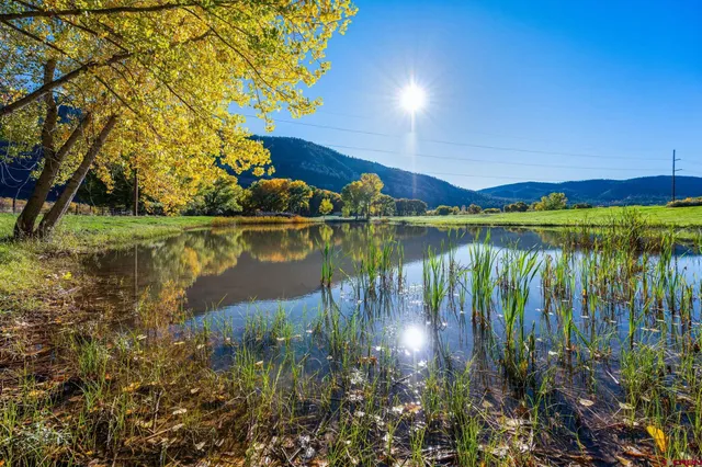 a view of a lake with a mountain in the background