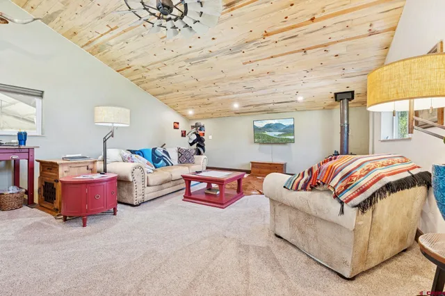 a bedroom with furniture and a couch