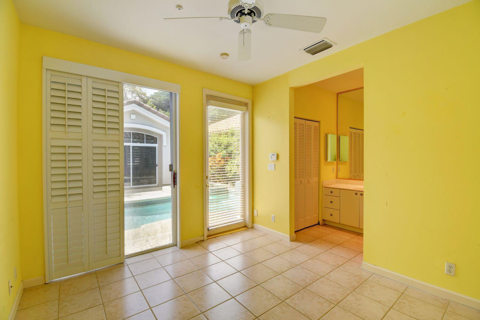 20710 Northwest 29th Avenue Boca Raton, FL 33434 - Photo 15 of 35 a view of a hallway with wooden shelves