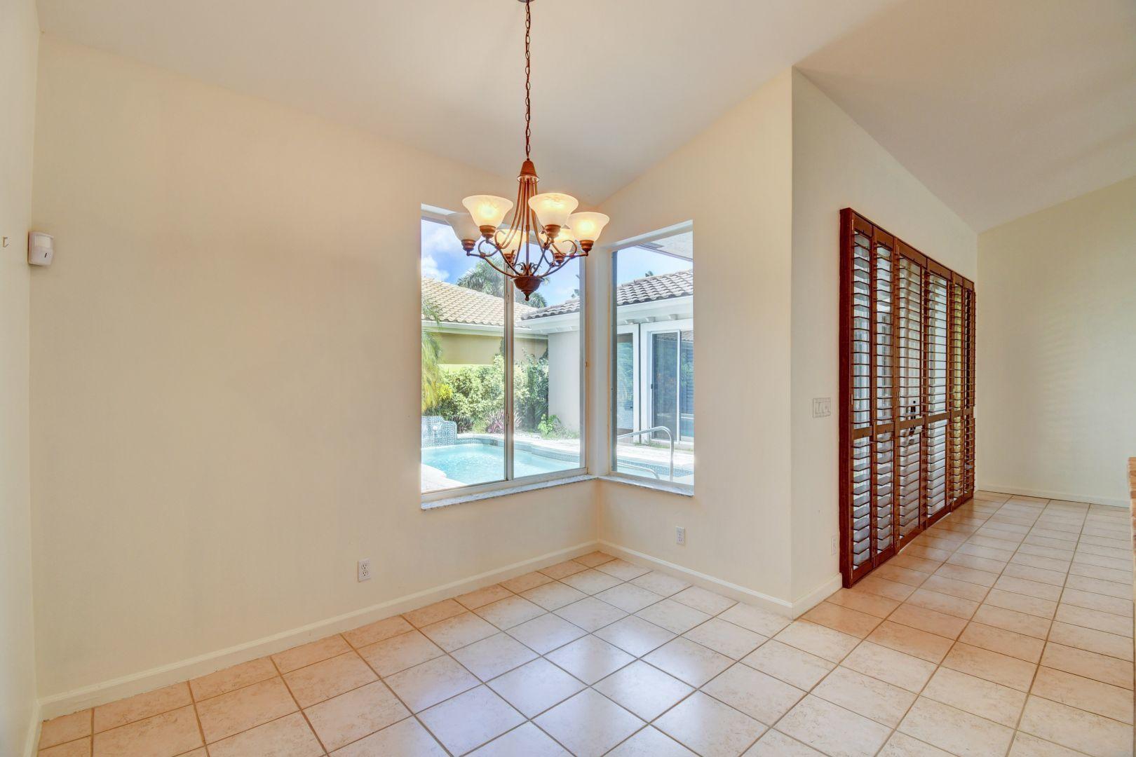 20710 Northwest 29th Avenue Boca Raton, FL 33434 - Photo 24 of 35 a view of an empty room with window