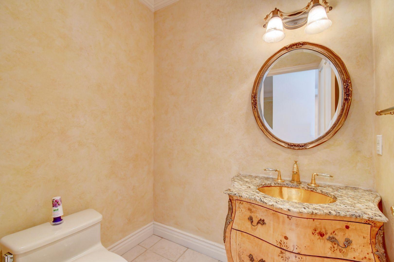 20710 Northwest 29th Avenue Boca Raton, FL 33434 - Photo 9 of 35 a bathroom with a sink and a mirror
