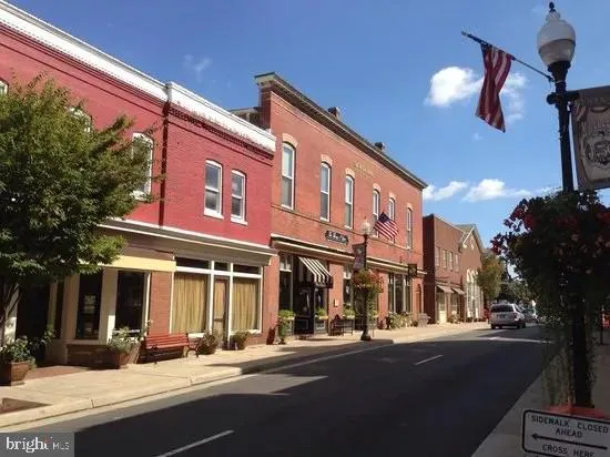 a view of a building with a street